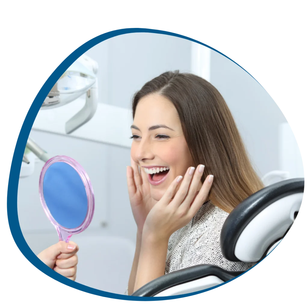 A happy patient showcasing a bright smile after receiving cosmetic dentistry and cosmetic dental treatment in South Delhi.
